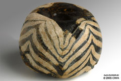 Trail-decorated bead, 332-30 BC