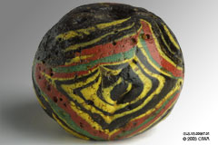 Mirror decoration bead, 900-1200 AD