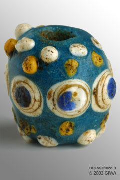 Head bead with eyes and prunts, 500-300 BC